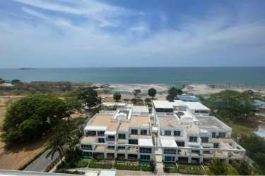Aerial photograph of Playa Blanca beach, lagoon and beachfront condo towers