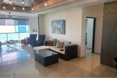 Open concept kitchen with breakfast counter and appliances PH Terrazas de Farallón