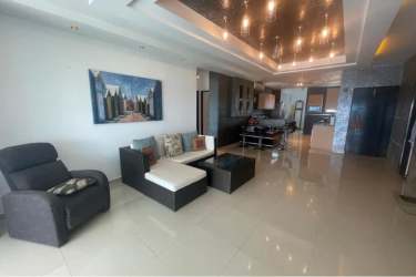 Bright living-dining room with ocean view balcony at PH Terrazas de Farallón Playa Blanca Panama