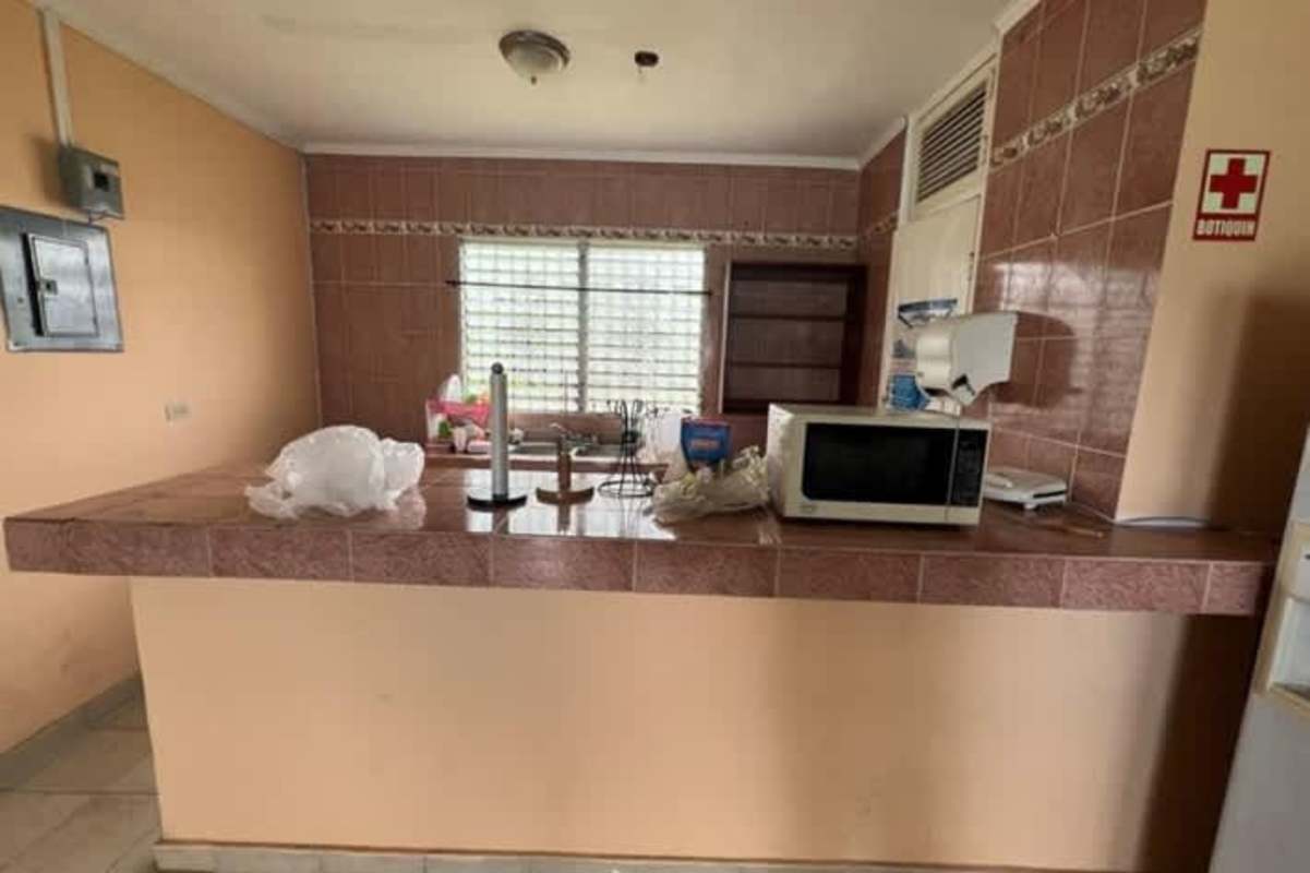 Interior of workspace with computers of Aldeas SOS former complex Costa Arriba Colón Panama commercial site