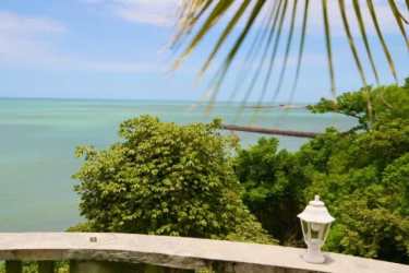 Tropical thatch-roof bohío gazebo with Pacific ocean vistas in Costa Esmeralda villa Panama