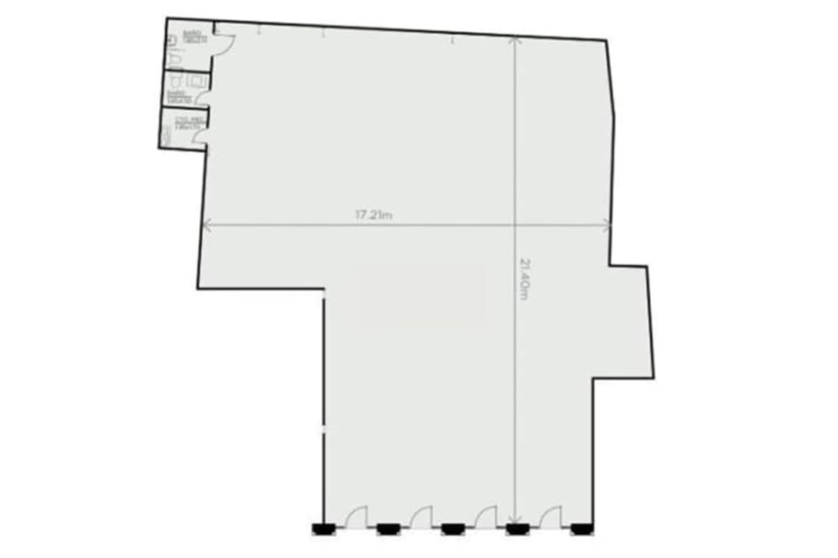 Restored colonial facade with balconies and central courtyard in Casco Viejo commercial plaza Panama City