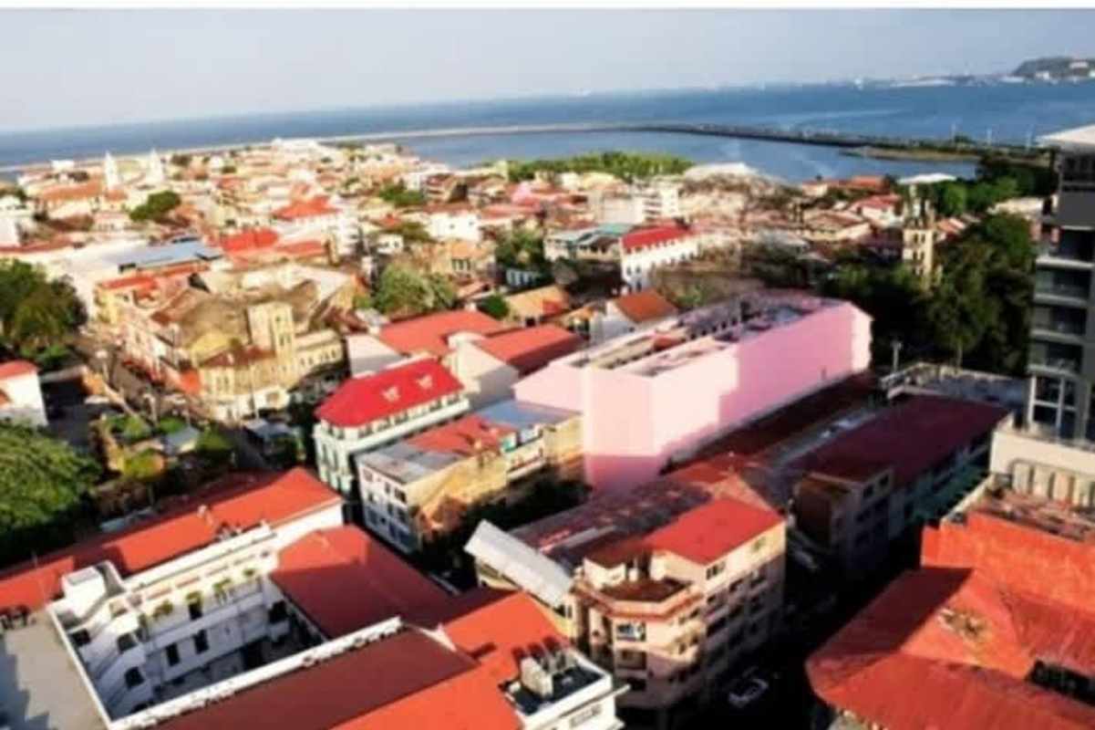 Aerial of Casco Viejo Panama near coastline with historic colonial architecture and red tile roofs