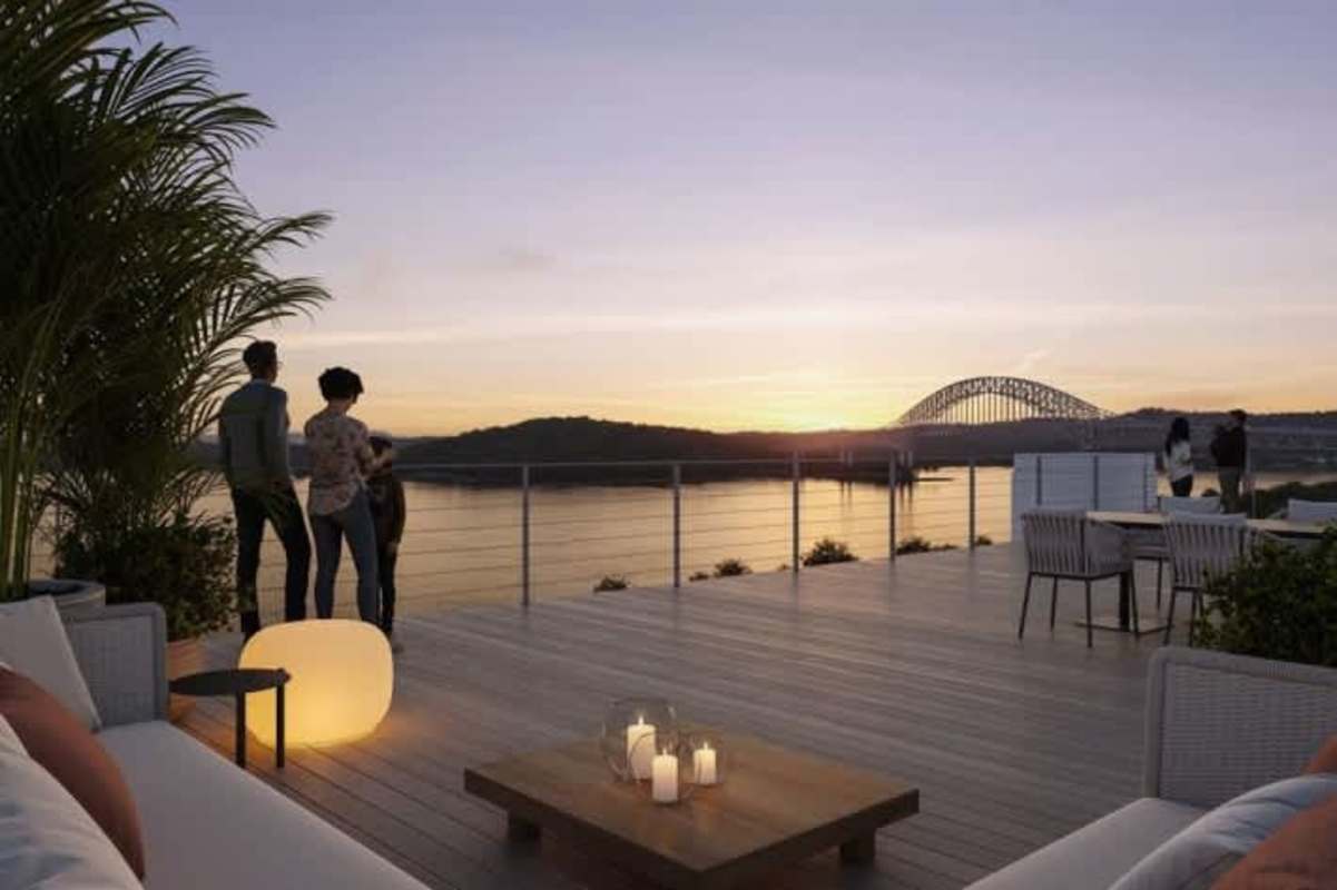 Rooftop lounge sunset view canal skyline apartment sale Panama Hola Realty