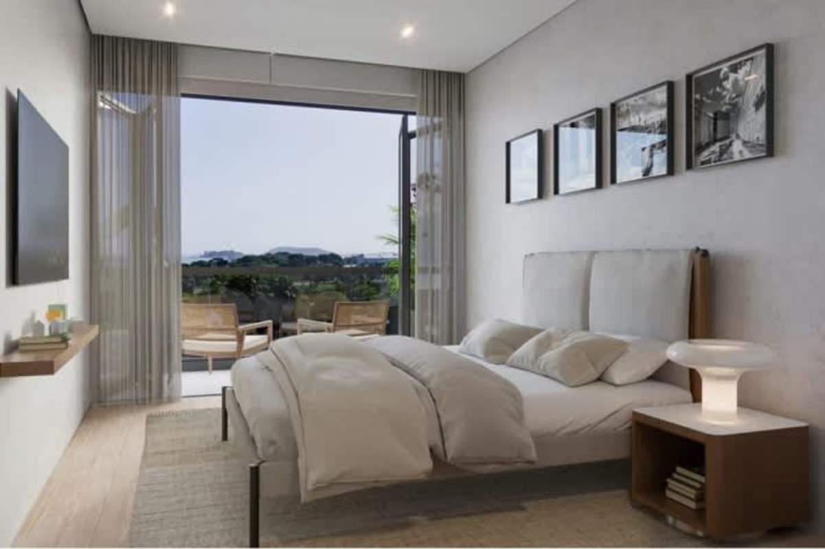 Modern bedroom with balcony access overlooking Pacific Ocean at PH Amador Edge Causeway Panama