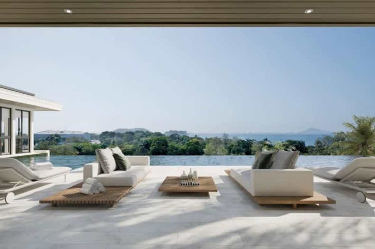 Outdoor patio with covered kitchen dining landscaped area infinity pool Amador Edge Panama