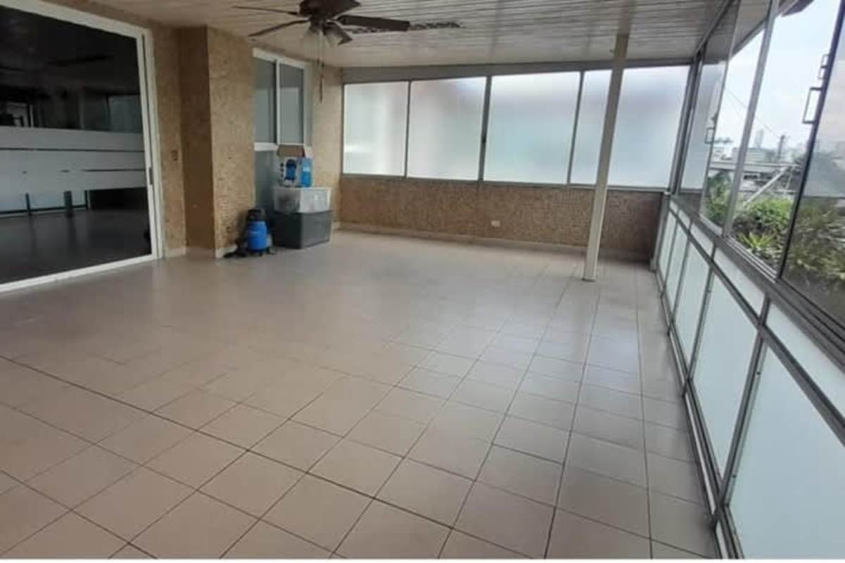 Minimally decorated bedroom with mirrored closet and tiled floor Betania multi-level house