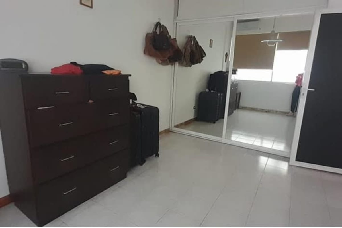 Bedroom with mirrored closet, dresser drawers, tiled flooring Betania Panama