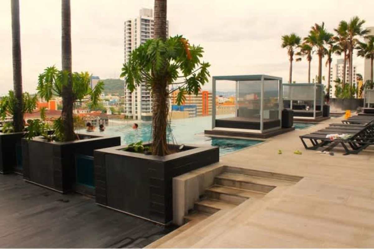 Spacious modern living room with balcony access in Nuovo Residences Marbella Panama