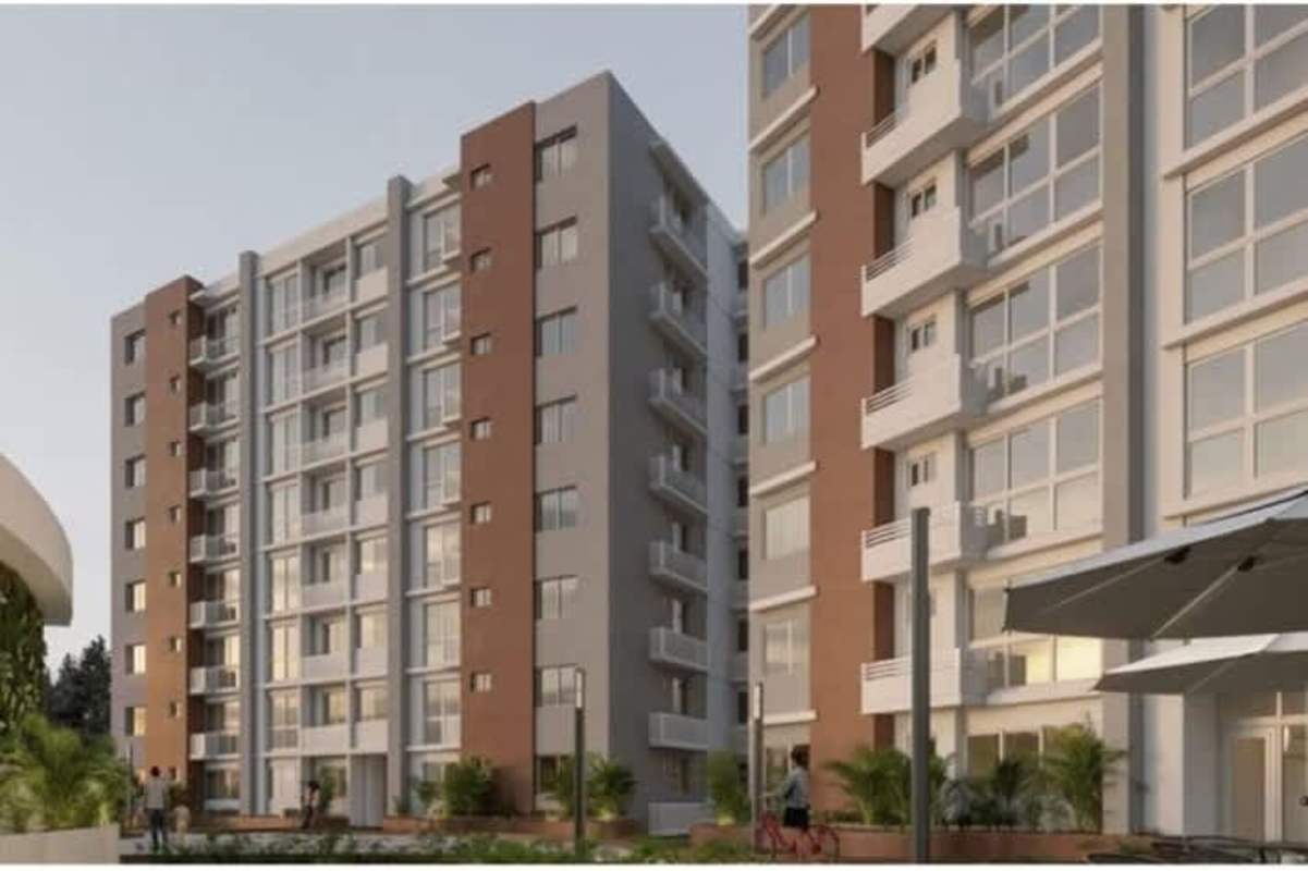 Facade of apartment towers at Albrook Residences with balconies, large windows, landscaped area