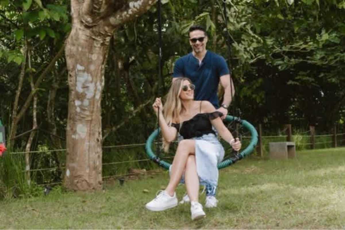 Lush backyard with swing hanging from mature tree in community Albrook Panama