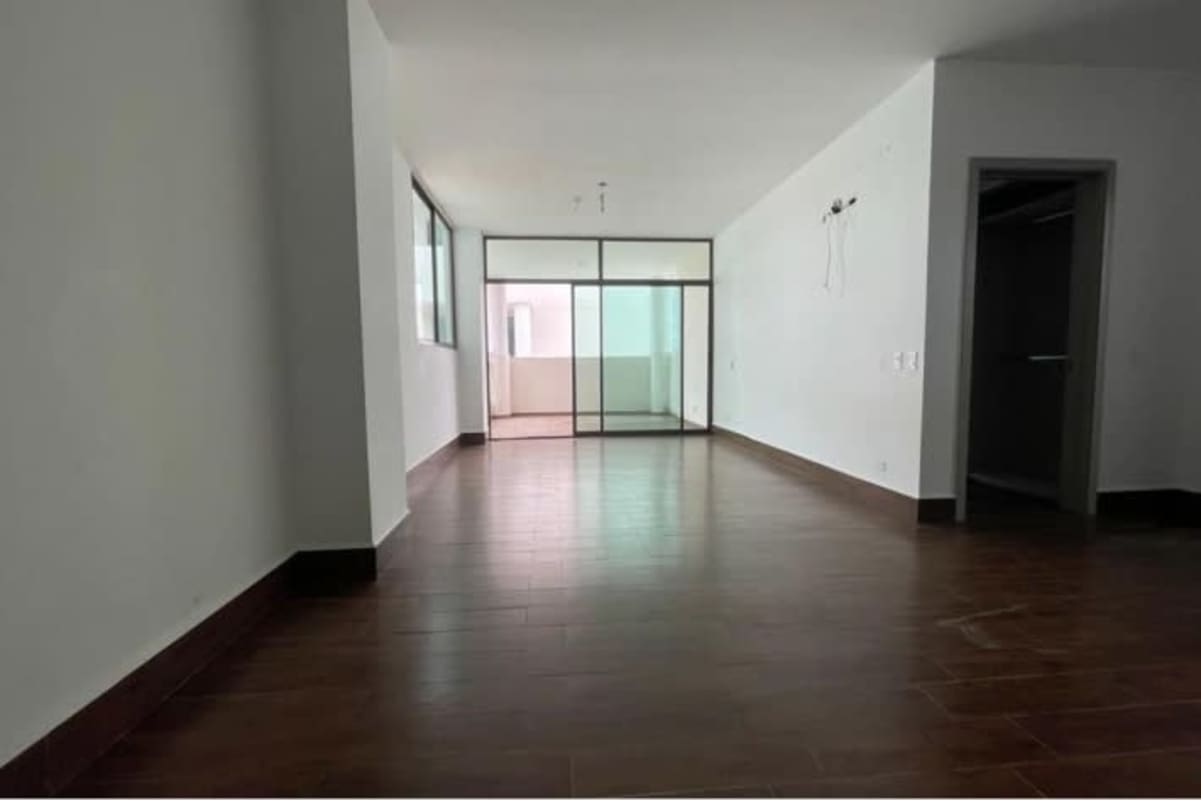 Contemporary bathroom with floating vanity, mirror, glass-enclosed shower at Costa Sur Club Residences Panama