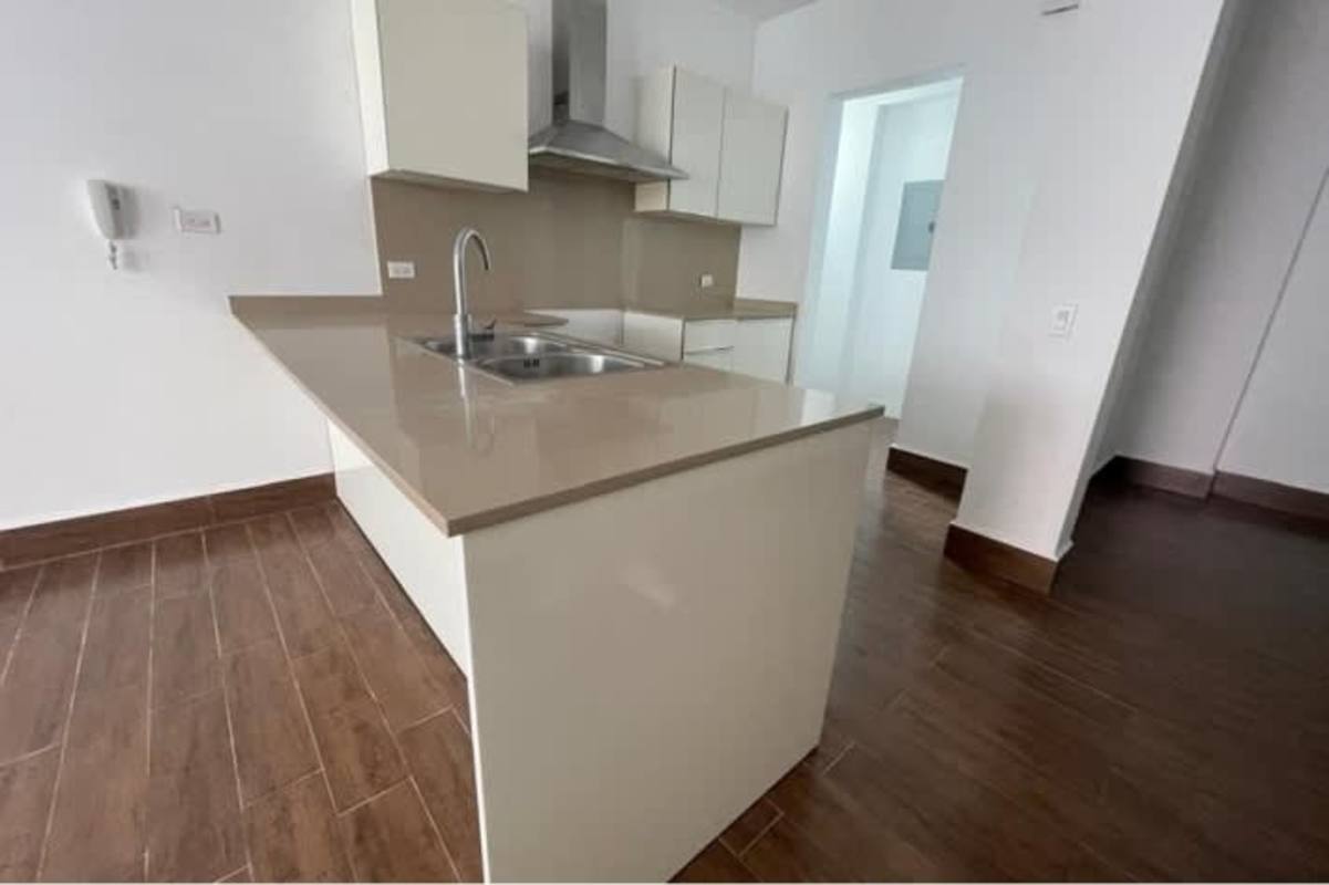 Second bedroom featuring large window, wood style tiles at PH Costa Sur Club Panama City