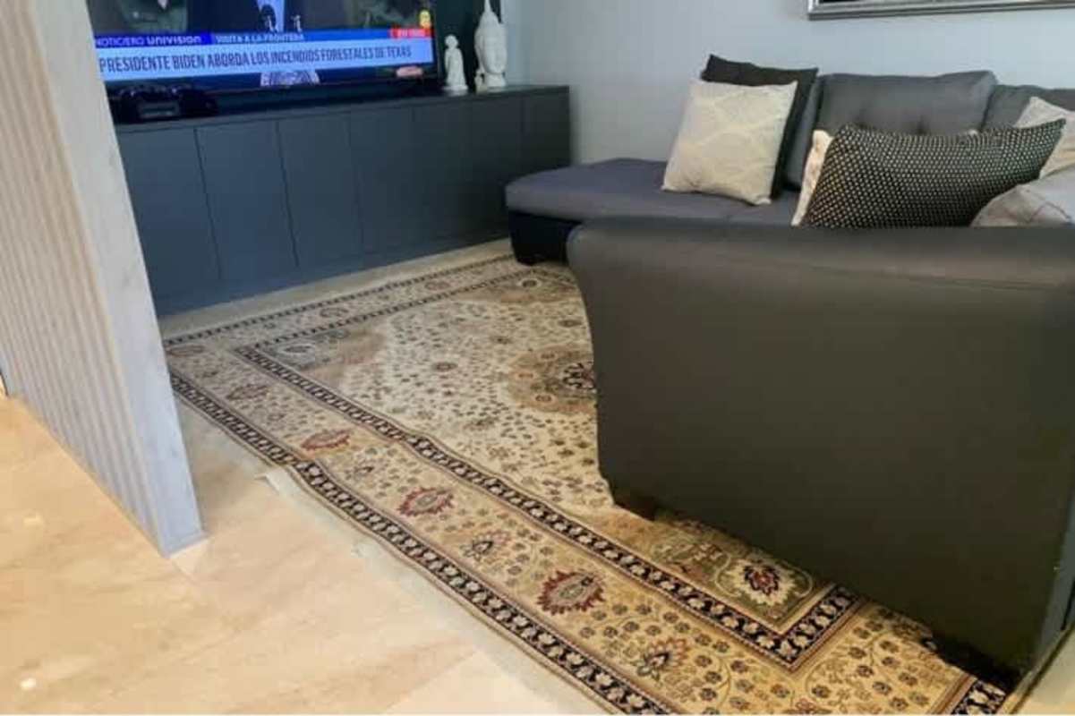 Elegant bedroom with bay and skyline views, hardwood floors, luxury finishes in PH Golden Palace Panama City