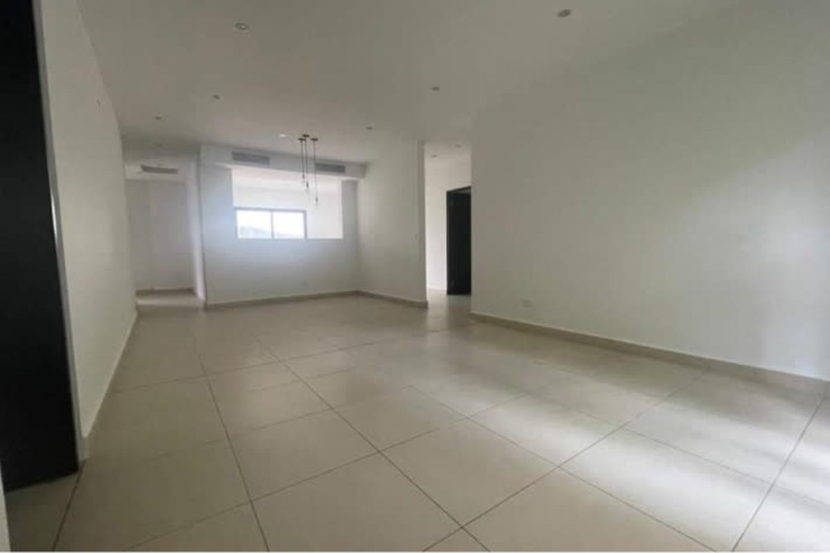Open living room with large windows and neutral tiles in PH Albrook Gardens Panama