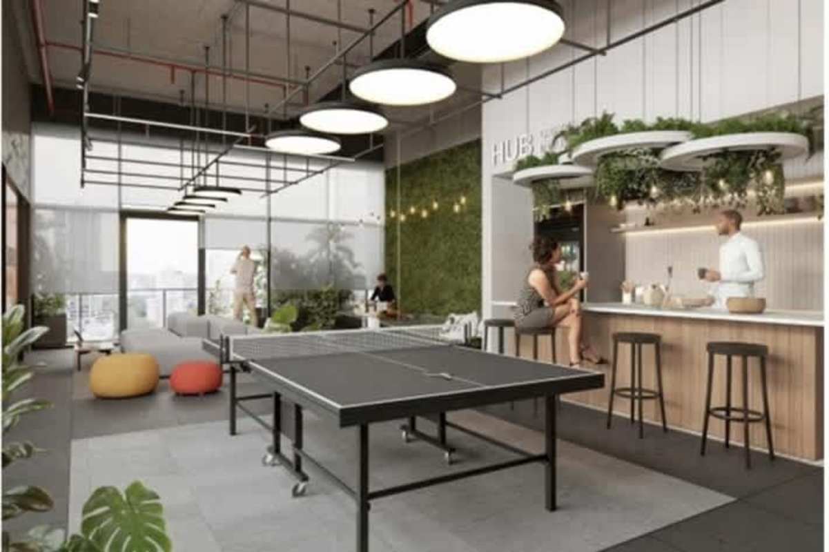 Common lounge with games, bar seating, ping pong at PH Vibe Bella Vista Panama