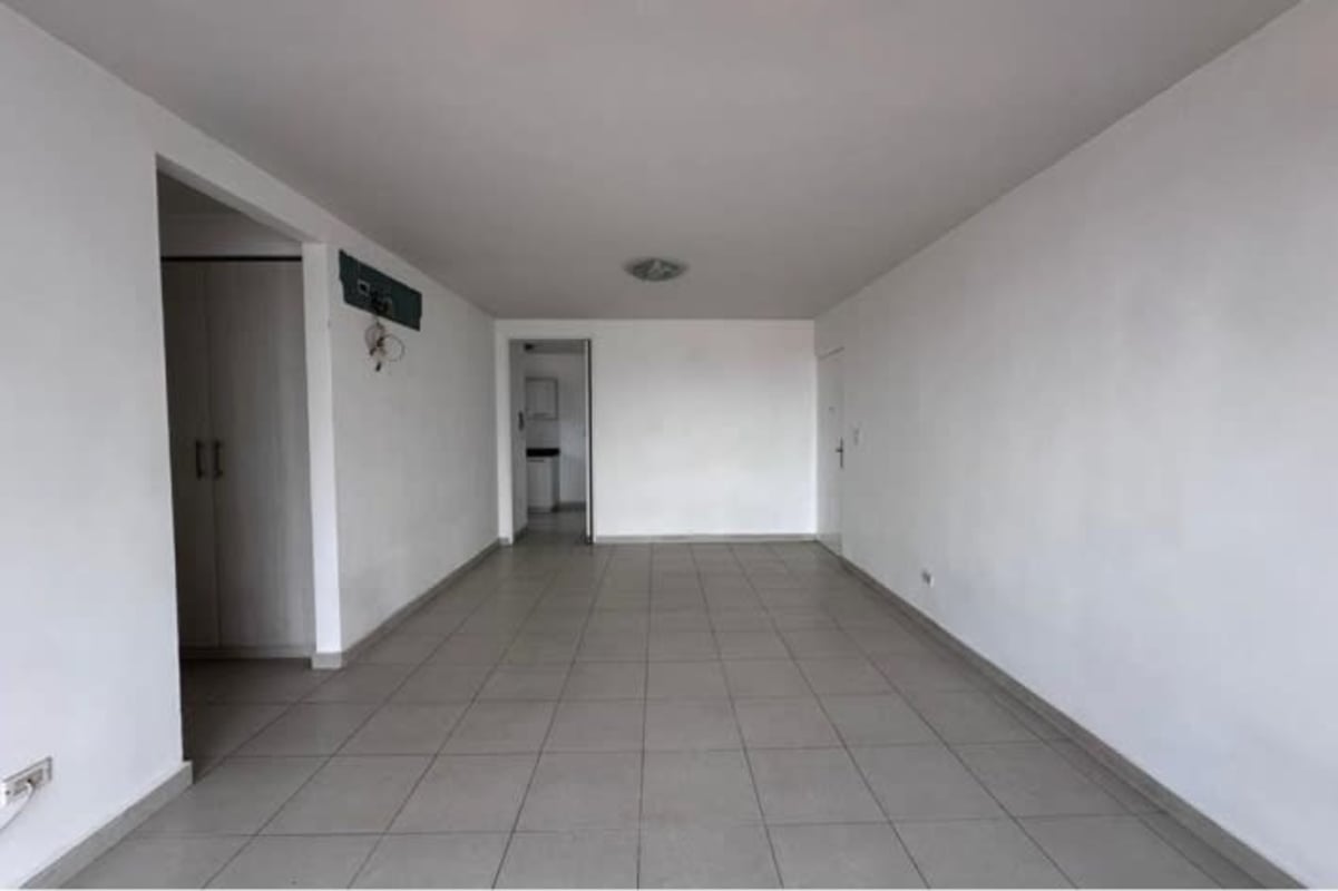 Outdoor playground with swings and climbing in gated complex Versalles Panama City