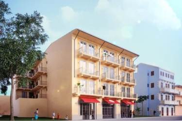 Aerial of La Quince Santa Ana multi-story building with red roofs in Panama City historical area