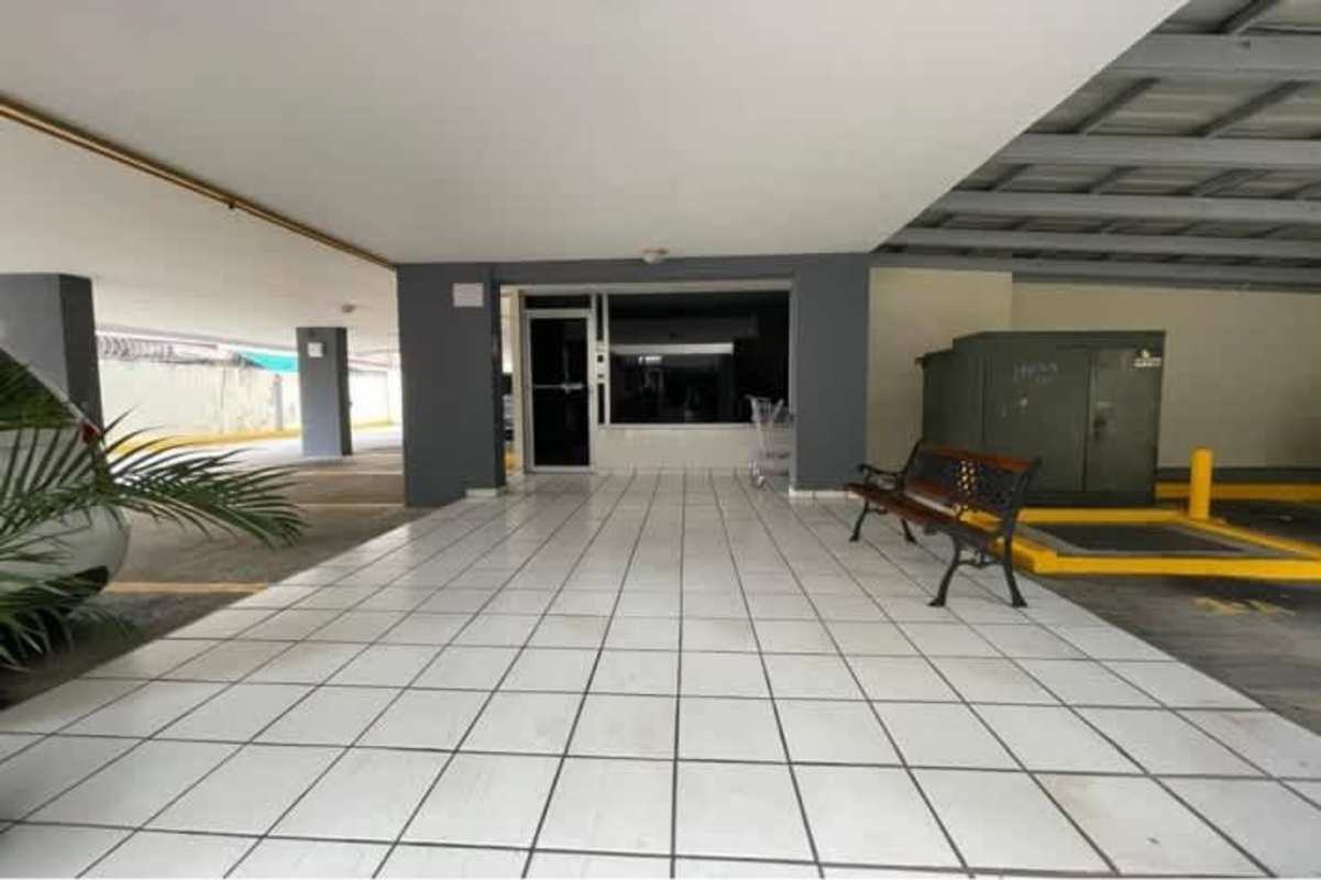 Open kitchen with granite countertop and dining in duplex apartment PH Villa Medici Bella Vista Panama