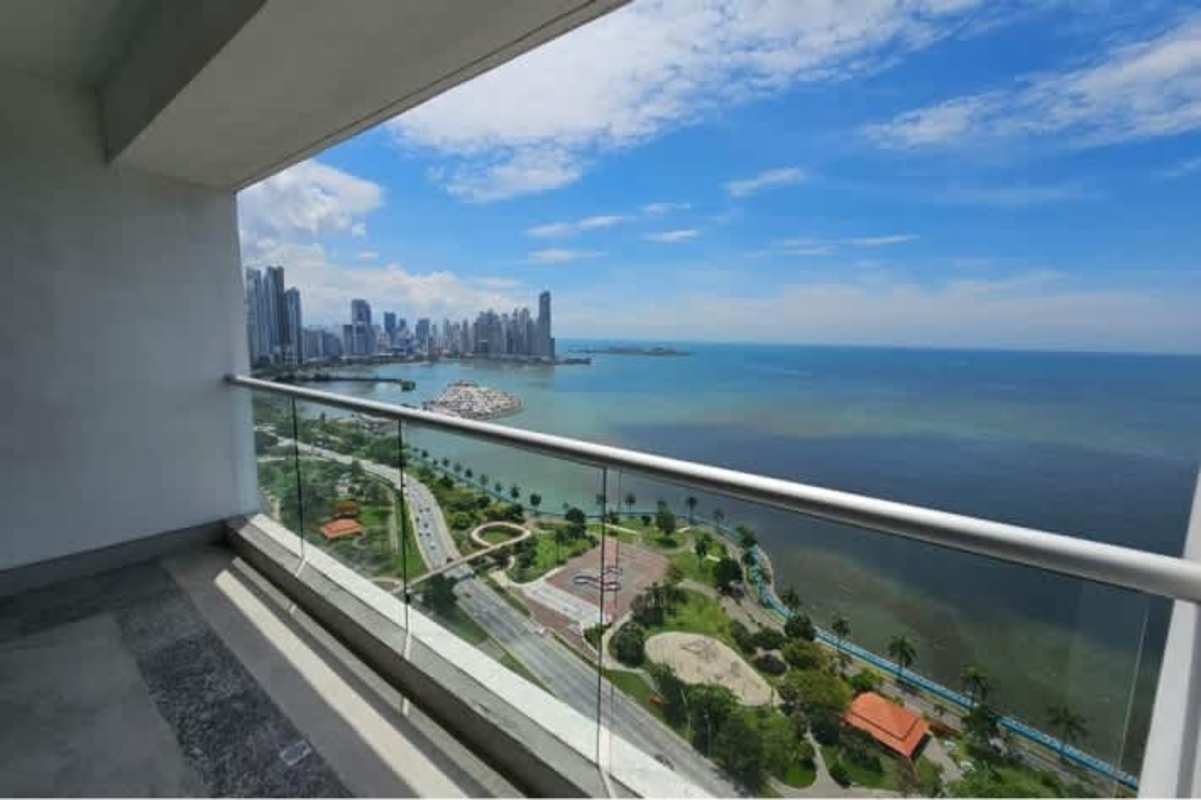 Spacious open kitchen with granite counters and stainless steel appliances PH Rivage Tower Panama