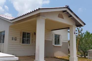 Master bedroom with closet air conditioner tiled floor at Playa Dorada residential Arraiján Panama