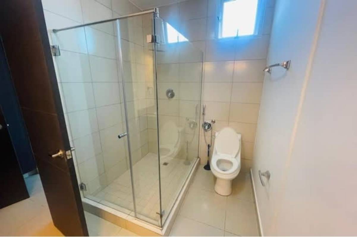 Bedroom in PH Titanium Panama City with built-in closet, AC, neutral colors