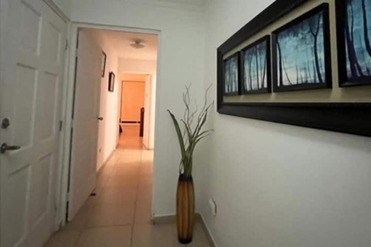 Bedroom featuring private bath, built-in closets in PH Parque del Mar Costa del Este Panama