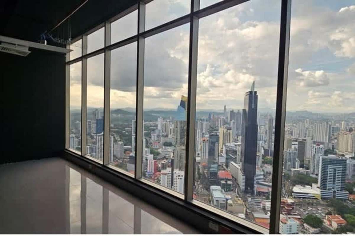 Wide panoramic commercial office floor with floor-to-ceiling glass and ocean views at BICSA Tower Panama City