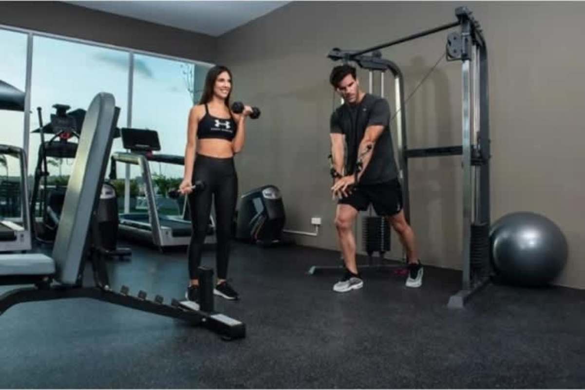 Indoor lounge with seating, plants and lighting at PH Villa las Fuentes Panama City