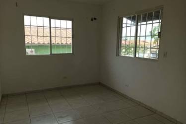 Living room with ceramic tiles and large window Altos del Campo La Chorrera Panama