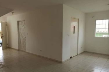 Bathroom with walk-in tiled shower in duplex home Altos del Campo Panama