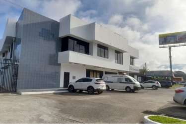 Glass storefront units in two-story commercial plaza Penonomé Coclé Panama