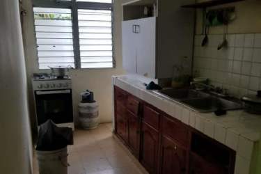 Basic kitchen with cabinets, countertops, louvered windows commercial unit La Chorrera