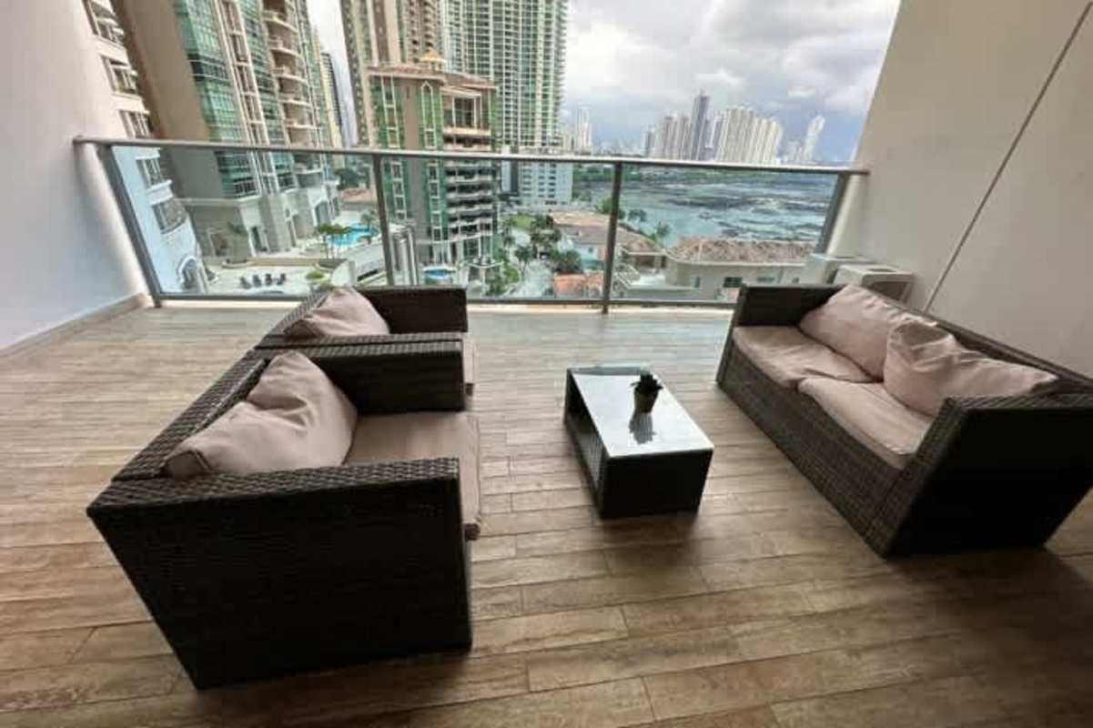 Master bedroom with balcony ocean view large windows marble floors in Grand Tower Punta Pacifica Panama