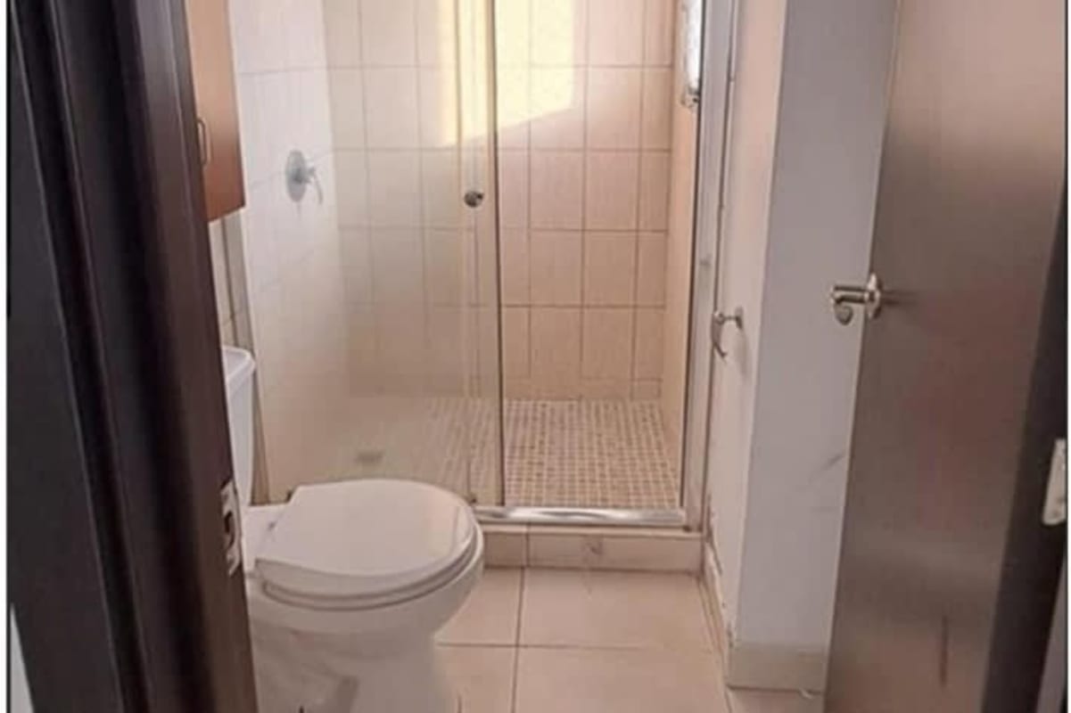 Balcony with panoramic view of Panama City skyline and neighborhood surroundings in PH Alegría