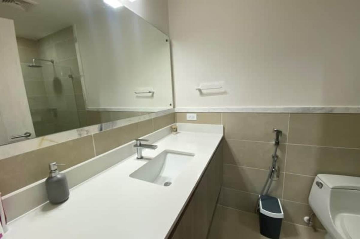 Contemporary bathroom with marble vanity and glass shower at Ocean House Santa Maria