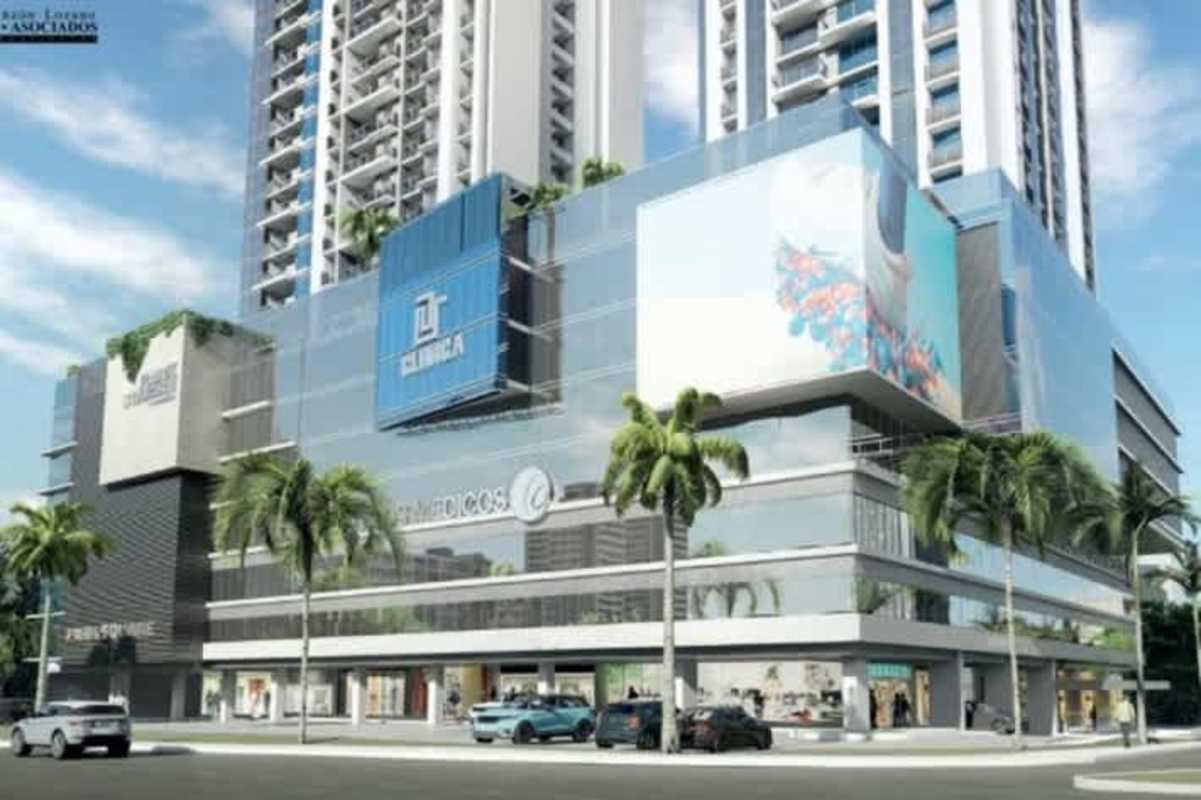 Modern bedroom with large window overlooking Panama skyline for sale in Park Square Tower