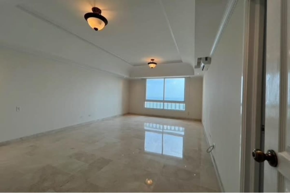 Bright family room or flexible den space with marble flooring at PH BICSA Panama