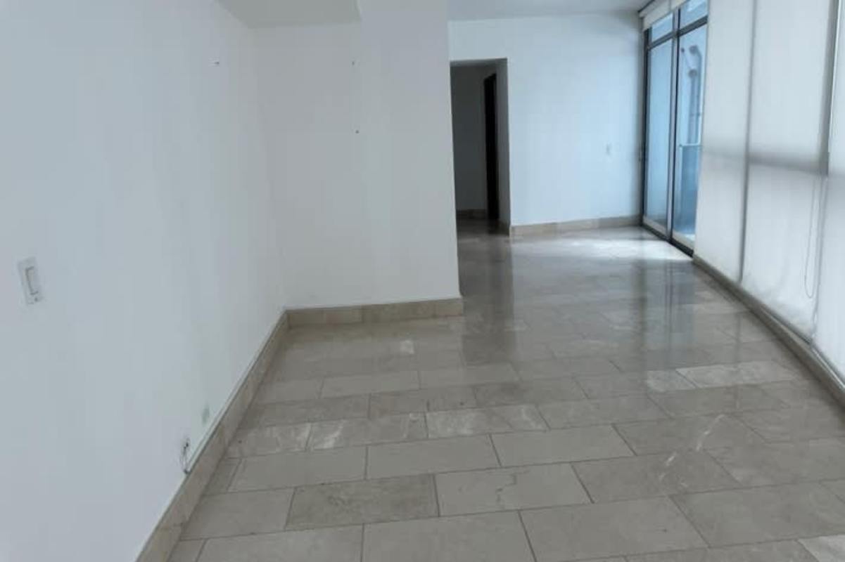 Bedroom with built-in wardrobe tile floors ocean view PH Grand Tower Punta Pacífica Panama