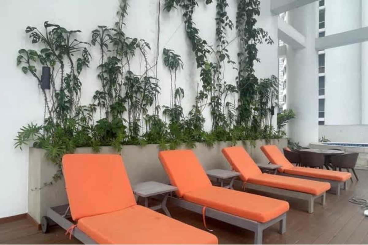 Rooftop pool with skyline and ocean views in PH Pacific View Panama