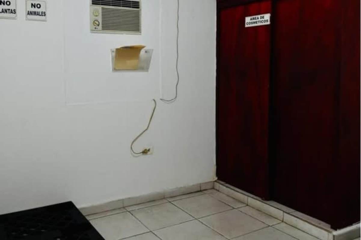 Warehouse interior showing metal shelving and concrete flooring in Pueblo Nuevo Panama
