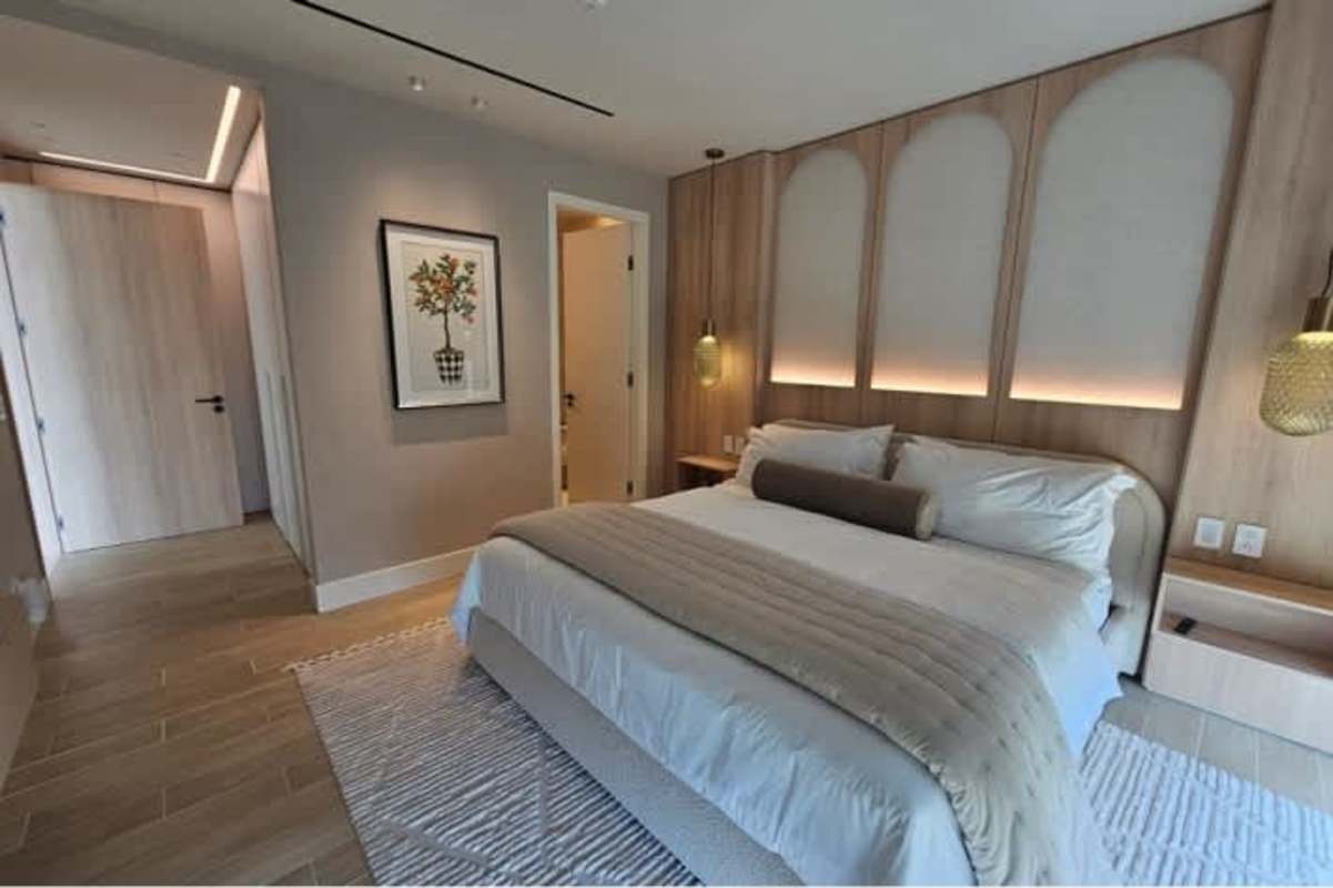 Modern kitchen with sleek cabinetry, island and dining area Ocean Reef Islands Panama