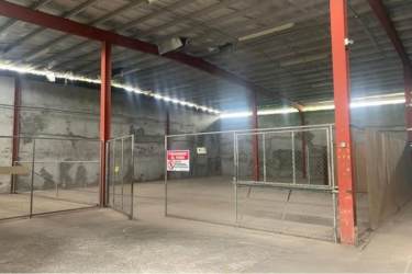 Interior of spacious high ceiling warehouse with concrete walls La Chorrera Panama
