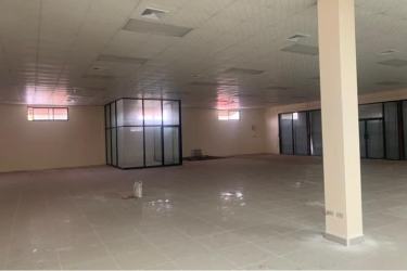 Driveway with parking space outside commercial warehouses in Panama West