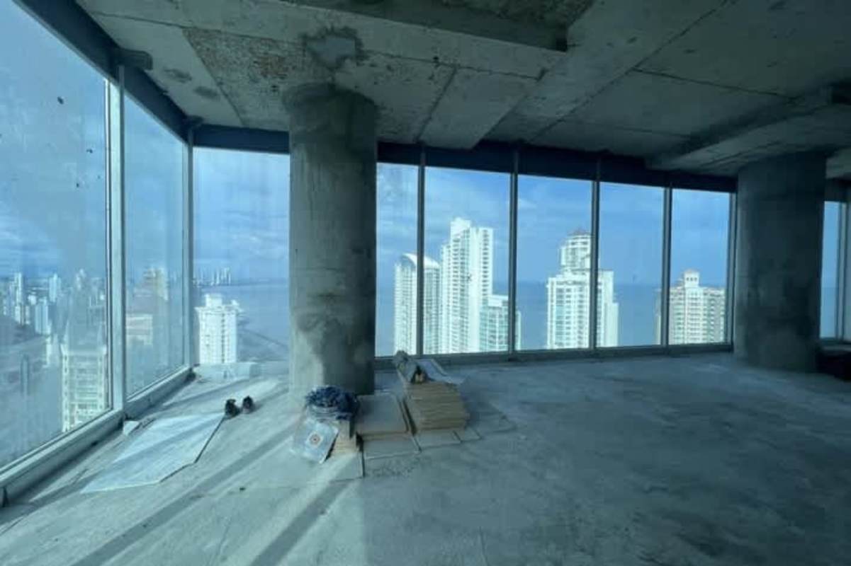 Panoramic city views through floor-to-ceiling windows in shell condition office space at Oceania Tower, Punta Pacifica Panama City