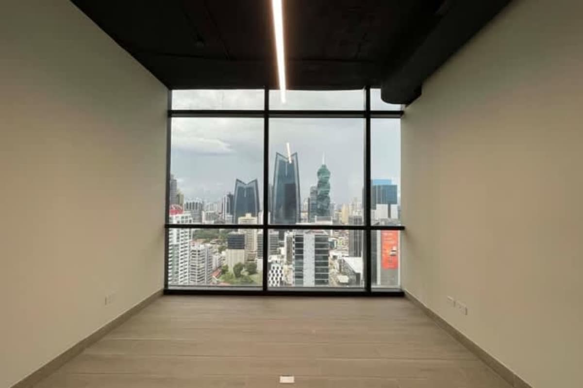 Bright office space with floor-to-ceiling windows city skyline Tower Financial Center Obarrio Panama
