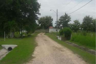 Entrance sign and decorative landscaping at Valle de Toscana gated residential project in Coclé Panama