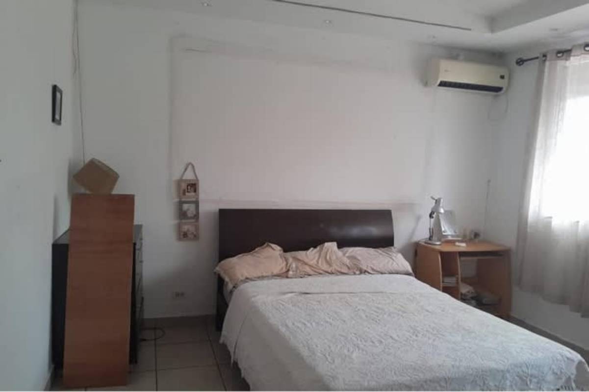 Bedroom with ensuite bath and vanity sink commercial residential use Panama