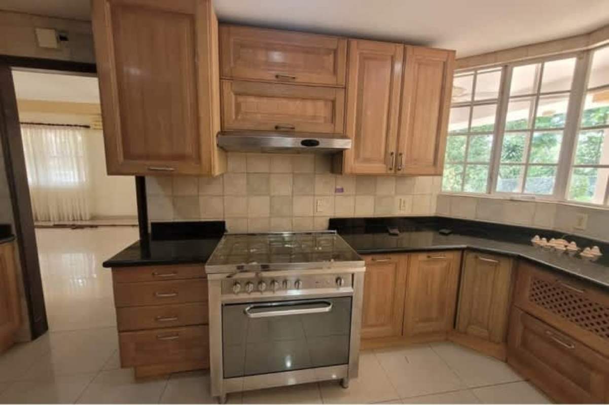 Luxury bathroom with jacuzzi, large mirror and modern tile in Altos de Curundú house Panama