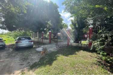 Gated fenced driveway tropical landscaping home secure entrance Gorgona Panama
